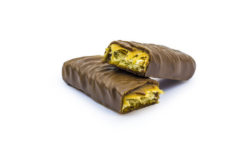 Chocolate bar with caramel isolated on white background. Clipping path included.