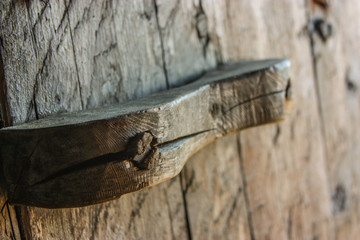 old wooden handle on a door