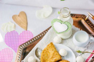 Breakfast in bed on Valentine's day in hotel