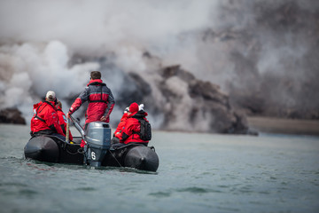 observing from a boat, Snow volcano activity, Chirpoy Island, Russia