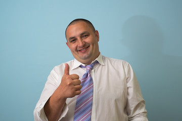 Businessman showing thumb up