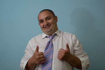 Businessman showing thumb up