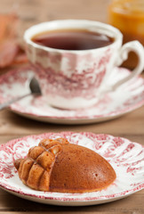 Homebaked Cake, Acorn Shape. Cup Of Tea. Toffee Sauce.
