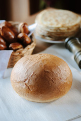 Fresh and hot bread on table