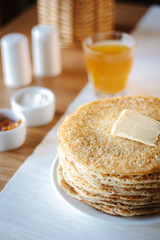 Hip of thin russian pancakes, called blini, at restaurant.