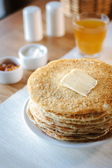 Stack or pile of pancakes at russian restaurant.