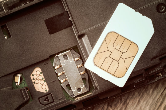 SIM Card On The Mobile Phone