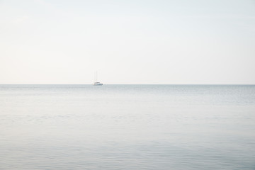 sailboat sailing in sea against clear sky