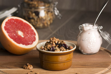 Granola from several types of cereals with nuts,coconut chips and dried cranberry.