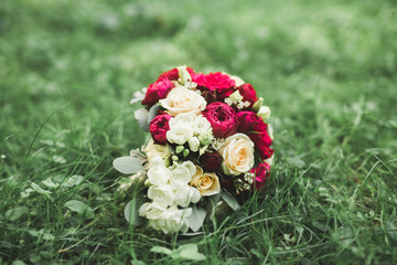 Wonderful luxury wedding bouquet of different flowers