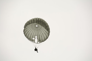 Parachute soldiers in the sky.