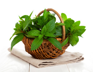 fresh mint in a basket © motorolka