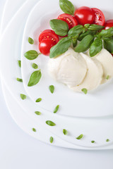 Mozzarella with tomato and  basil.