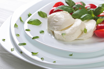 Mozzarella with tomato and  basil.