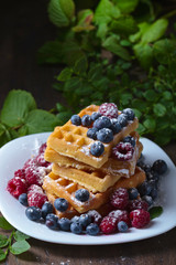 Waffles with raspberry and blueberry