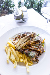 juice roasted lamb chops on the table
