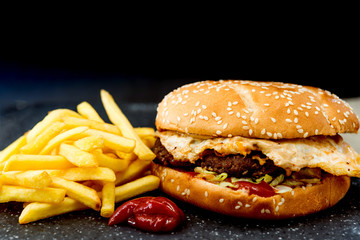 Cheese burger - American cheese burger with Golden French fries
