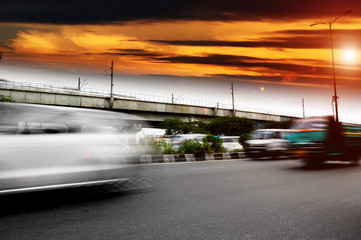 Blur motion traffic in Delhi with selective focus.