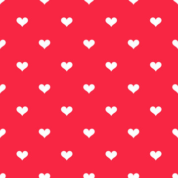White hearts on red background pattern