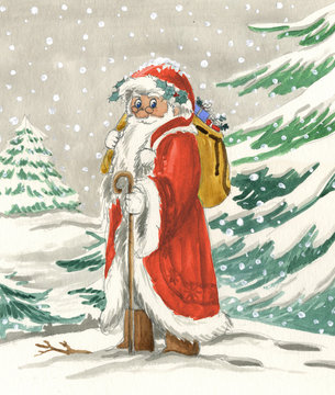 Traditional Santa Claus in snowy landscape with sack