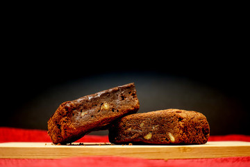 Chocolate Brownie cake on a dark plate