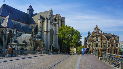 Fototapeta na wymiar The Sint Michielsbrug bridge the landmarks of Ghent, such as medieval mansions, St Nicholas Church and Belfort van Gent (Belfry), Belgium.