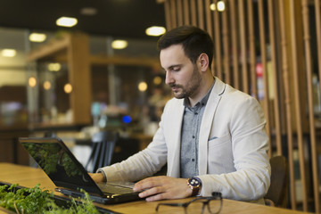 Fototapeta premium Businessman at the coffee shop