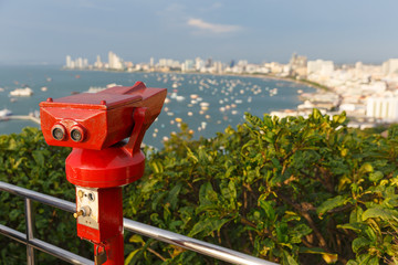 Binoculars on view point of Pattaya in Thailand