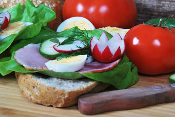 sandwich with radish ham and egg salad on a dietetic breakfast