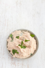 fish pate with herbs on white background