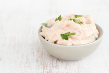 fish pate with herbs on white background