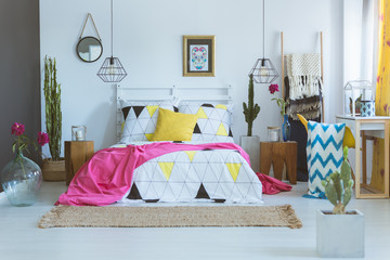 King-size bed in unique bedroom
