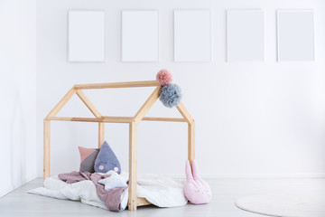 Kid's bedroom with pastel pillows © Photographee.eu