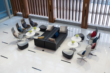 Modern office with Furniture set table and chairs. Interior of a company modern office. Public place.