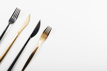 Background of forks and knives design on white background. Copy space.