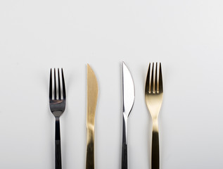 Background of forks and knives design on white background. Copy space.