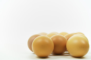 Fresh eggs on white background with copy space. Easter photo concept