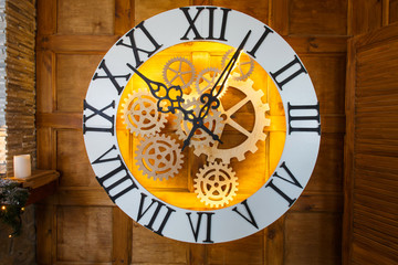 Fototapeta na wymiar Closeup of big fairy like clock with watch mechanism