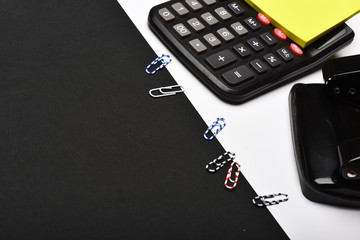 Business and work concept: office tools opposite black space
