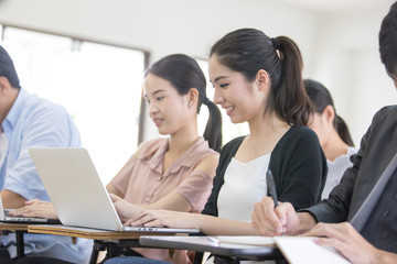 Asian People study together in classroom. People with Education concept.