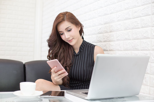 Asian Woman using Tablet for Work at Cafe, Woman Working with attractive smiling, Woman Working Concept