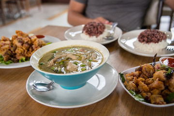 Thai food, Menu is Green curry and Fish omelette and Fried fish with herb.