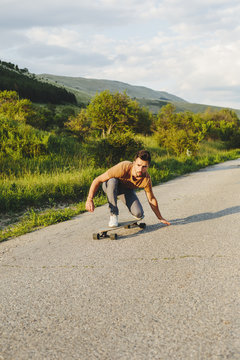 Young man longboarding