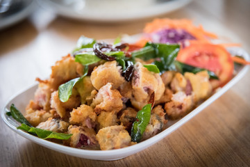 Fried fish and crisp bergamot and fried chili. Main course Thai recipe