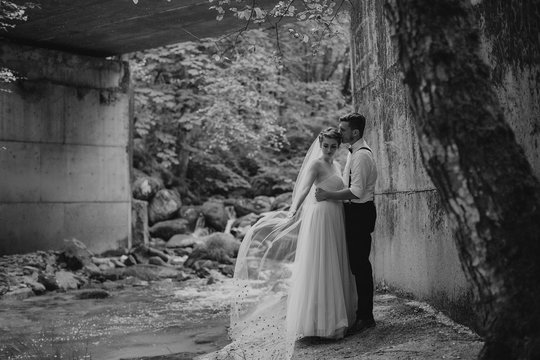Emily & EJ Under a Bridge