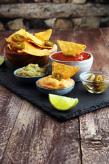Nachos Tortilla Chips and jalape&ntilde;os Chili Peppers or Mexican ch