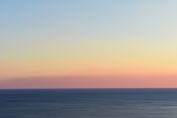 Naklejka na ściany i meble beautiful sunset over sea 