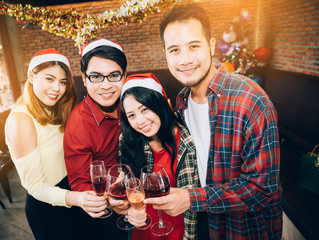 Asians people are together to celebrate the Christmas and Happy New Year party.