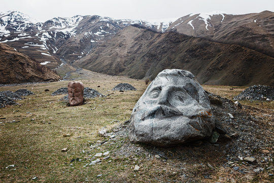 Stone face head in Sno valley in Georgia along the military road to Kazbegi