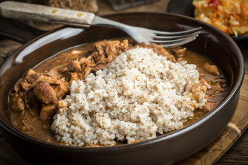 Barley groats with stewed meat.